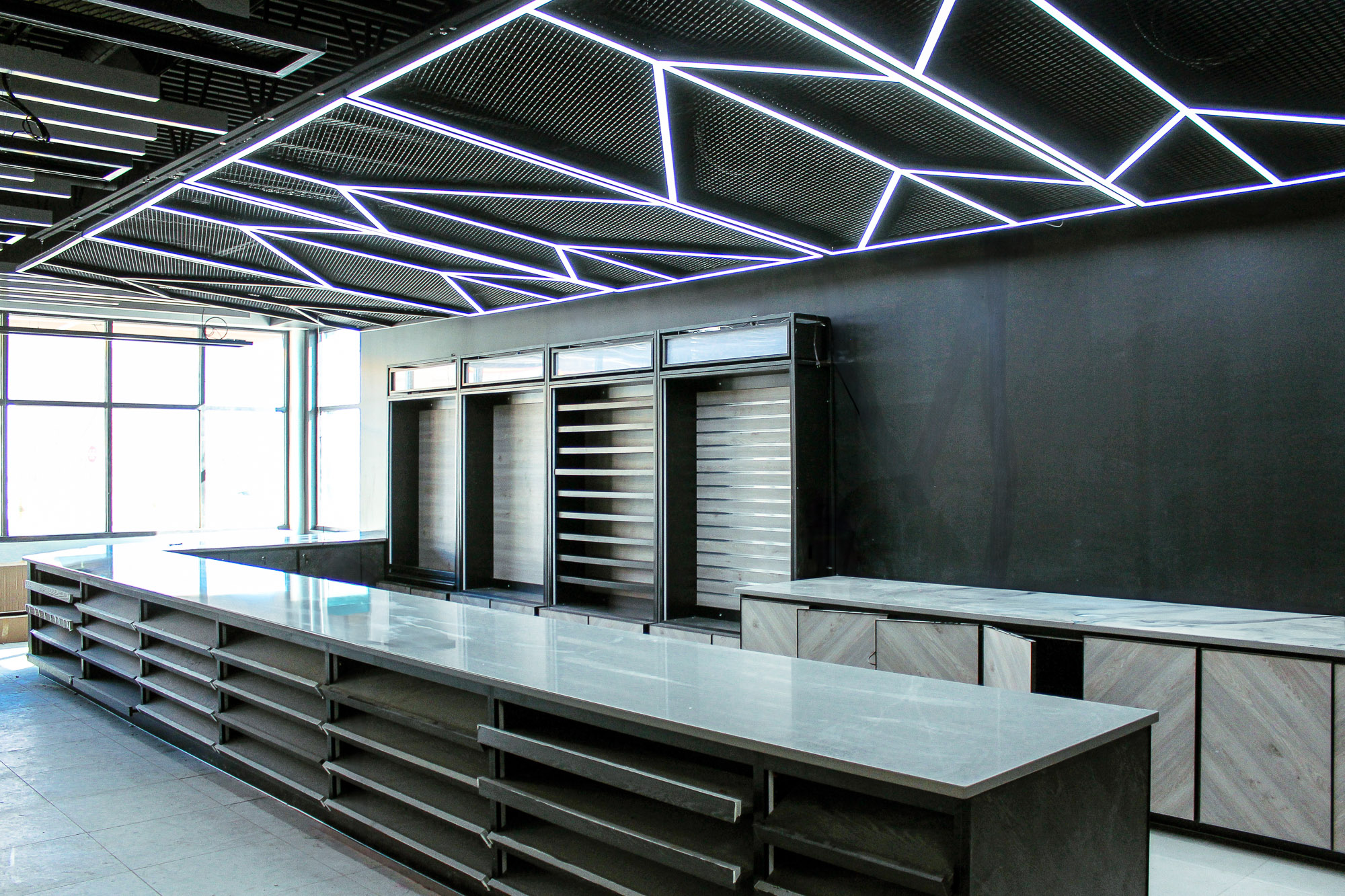 Energy-efficient lighting installed in the ceiling of a newly constructed building, showcasing modern sustainable electrical solutions.